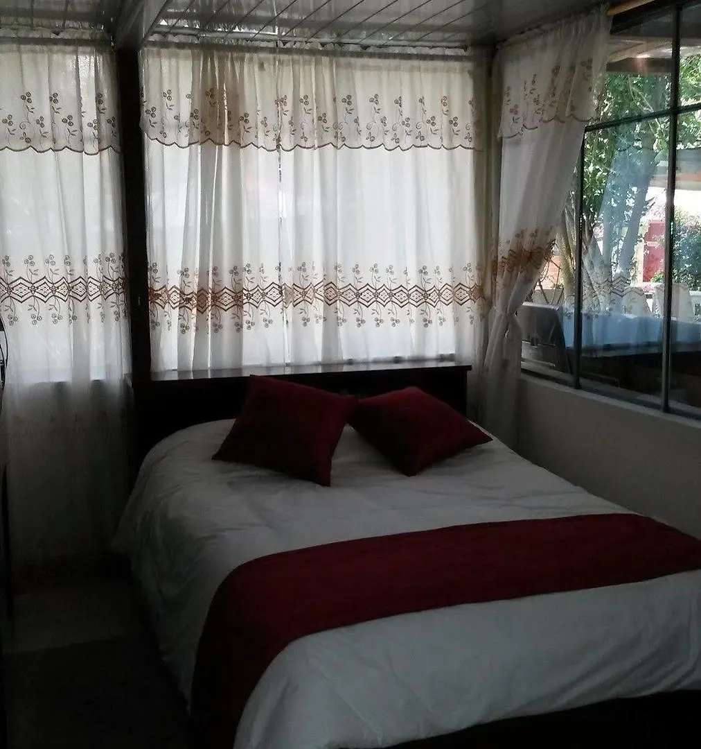 Hostal El Parque Табабела